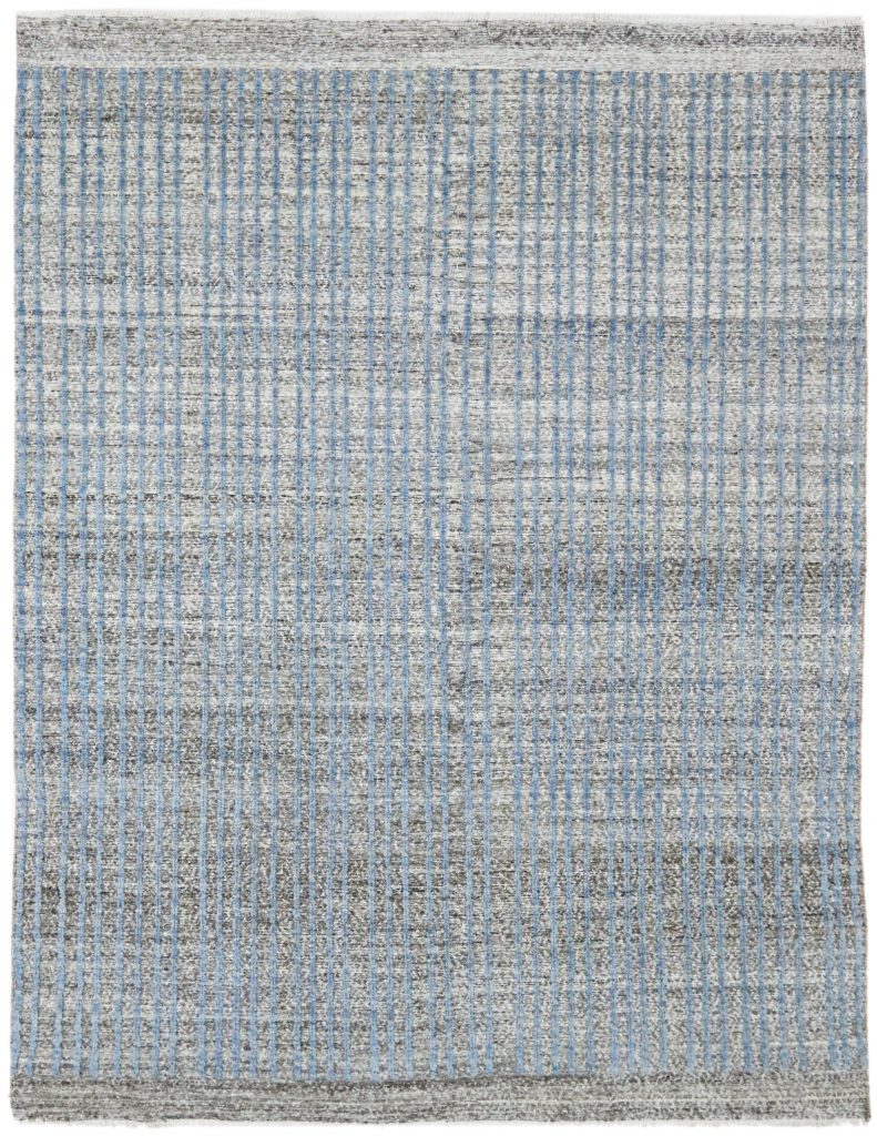 Der Kala Lai Kurzflor-Teppich besticht durch seinen Used-Look im Vintage-Stil, der einen harmonischen Mix aus cremefarbenen und braunen Grundtönen aufweist. Er zeichnet sich durch parallel verlaufende Linien in Hellblau aus. Erhältlich im Middleway Gallery und im Onlineshop