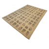Nav Tile Teppich, handgefertigt aus reiner Wolle, in Creme mit grauen Akzenten und modernem, geometrischem Muster. Erhältlich in Hamburg Middleway Gallery und im Onlineshop.